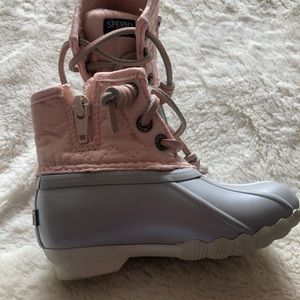 Sperry boots, pink and silver.